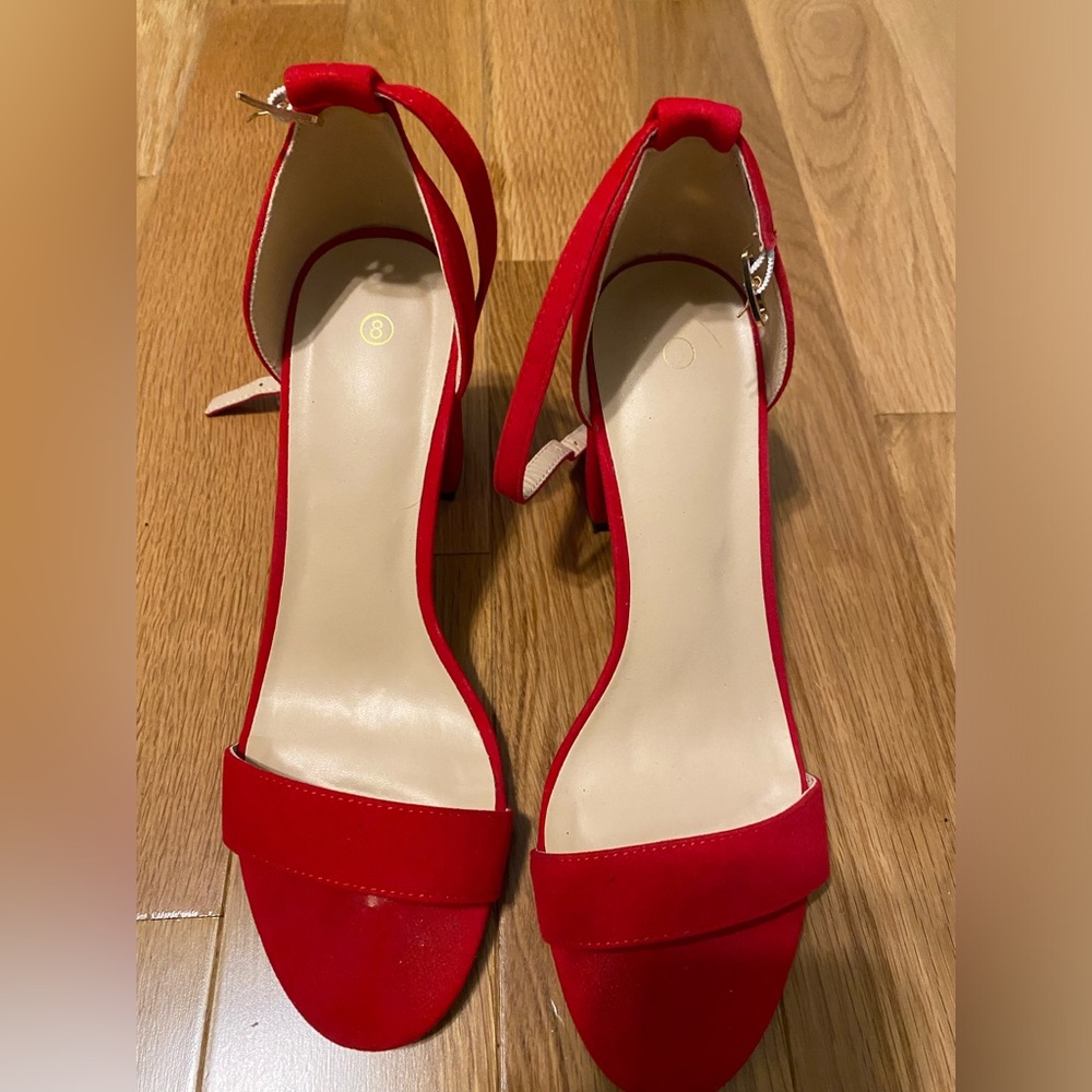 Red 3 inch heels.